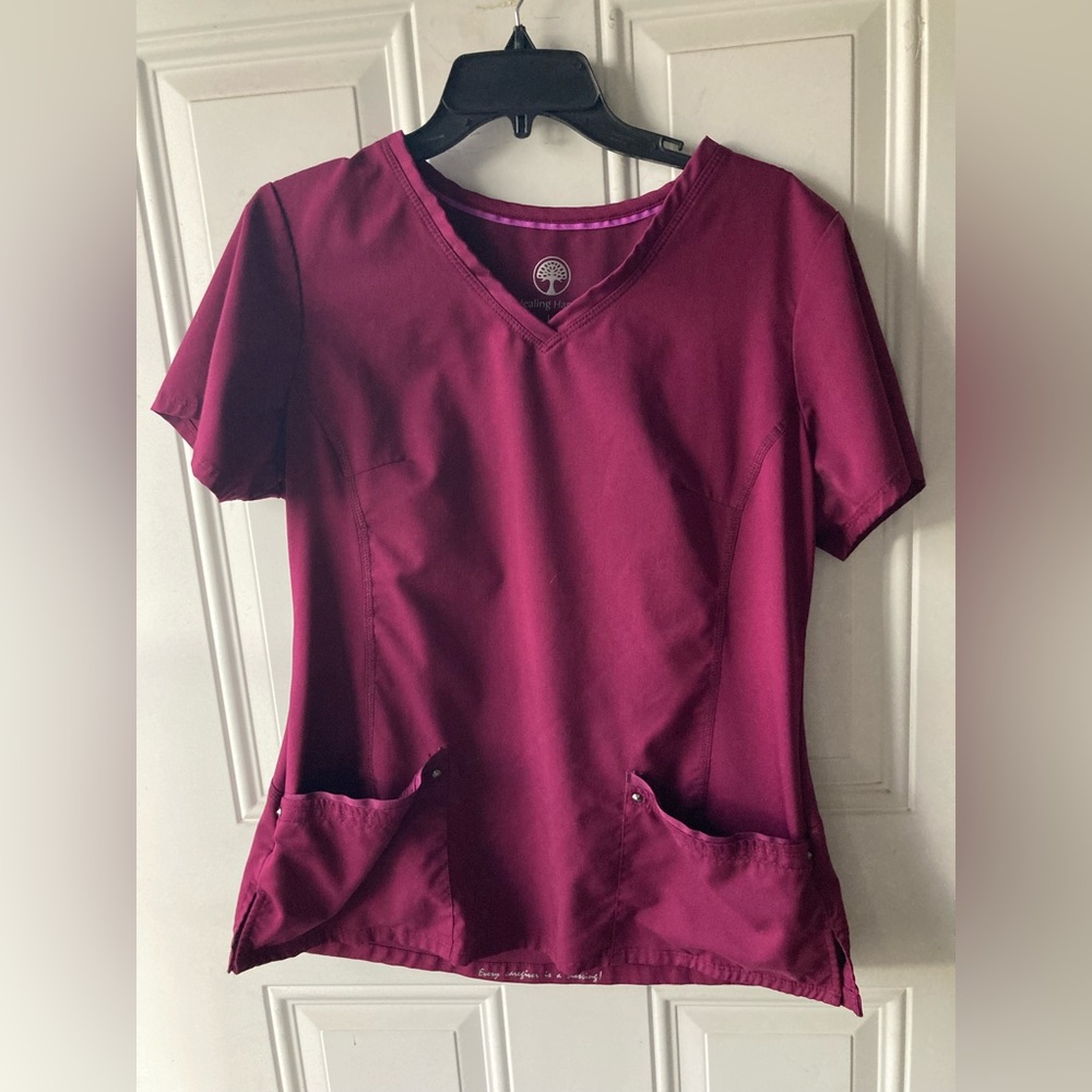 Woman’s maroon scrub top size L